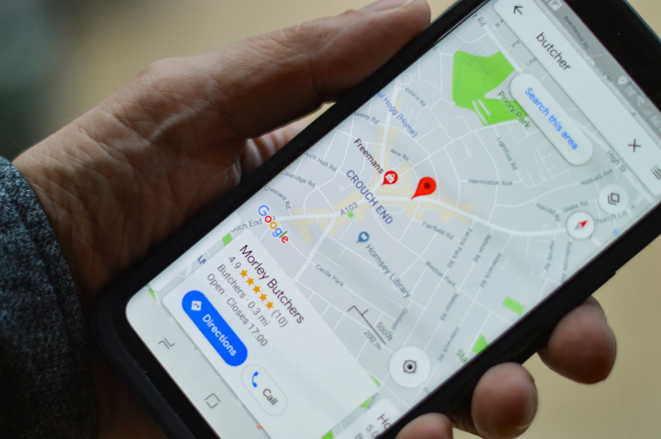 Local business listing on Google Maps on a phone