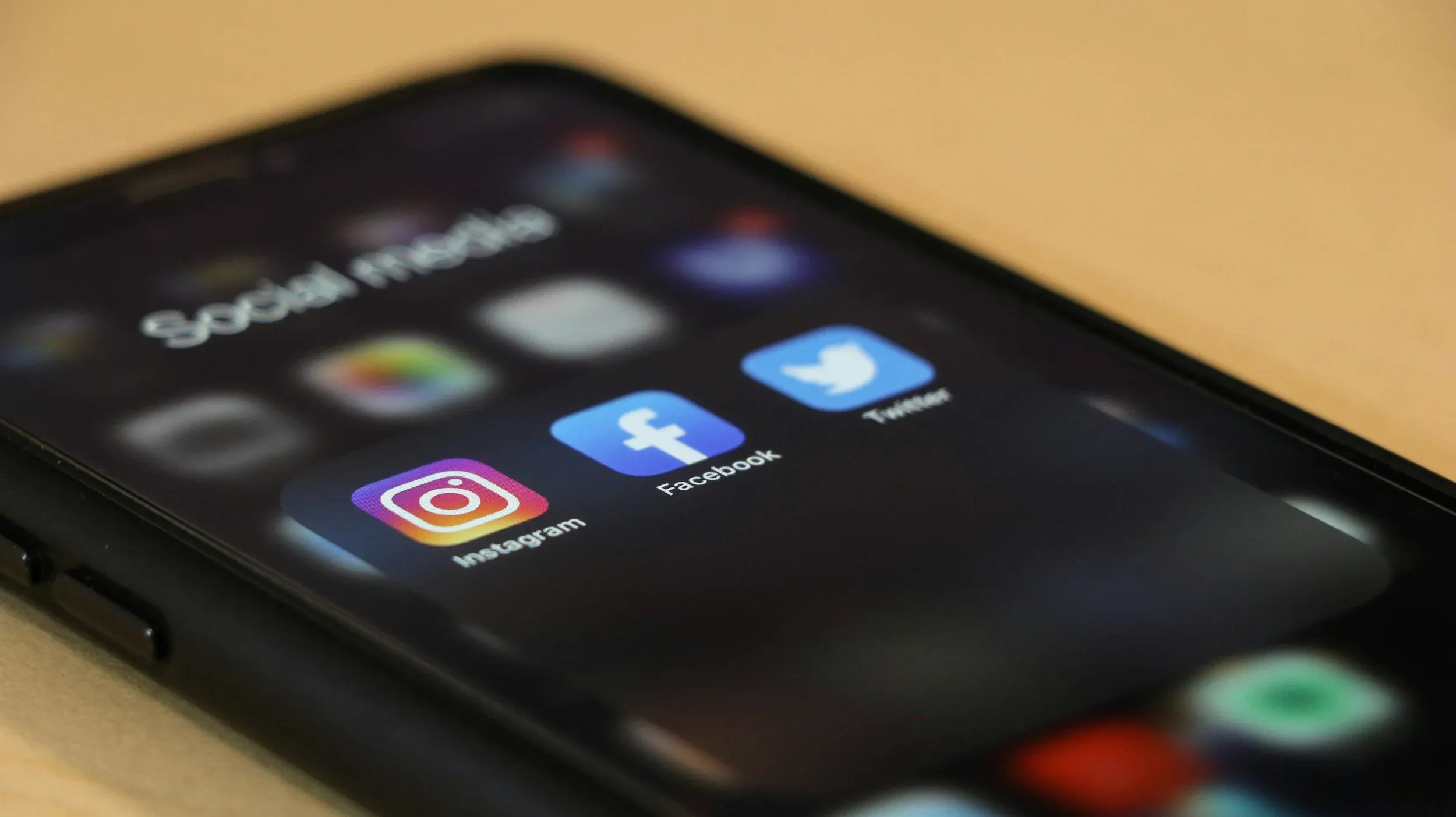 Phone showing Instagram, Facebook and other social media apps